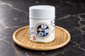 Shizuhime no Shiro matcha 20 g tin on a woven bamboo tray with a dark marble background