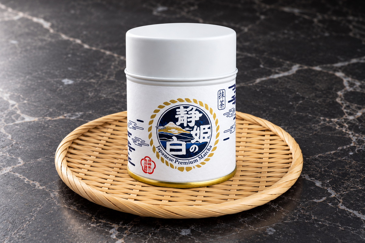 Shizuhime no Shiro matcha 20 g tin on a woven bamboo tray with a dark marble background
